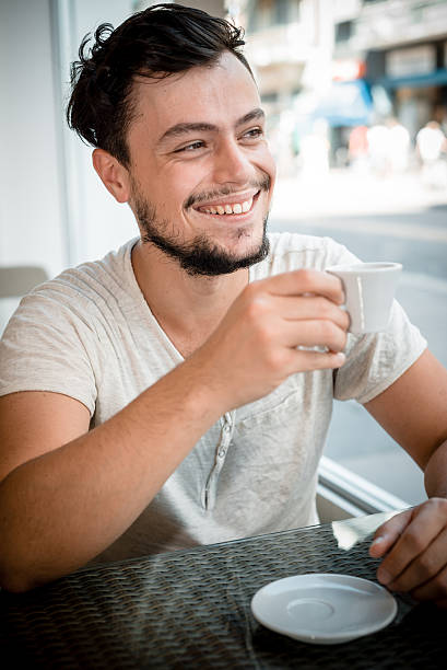 istock young stylish man at the bar 183895636
