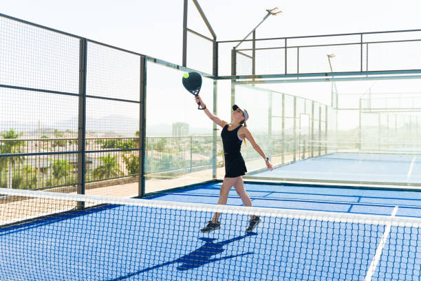 istock Attractive active woman enjoying practicing padel tennis 1838965389