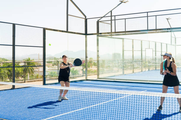 istock Beautiful women practicing padel playing a match 1838970993
