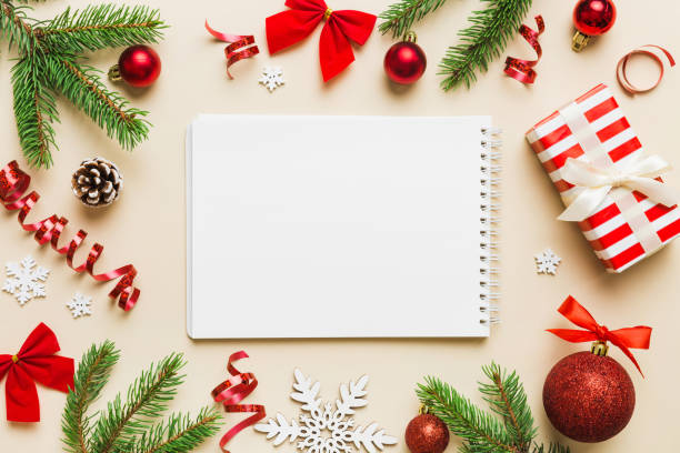 istock Christmas blank greeting card mock-up scene. Creative layout made of Christmas tree branches and paper card note. Flat lay. Nature New Year concept 1838986101