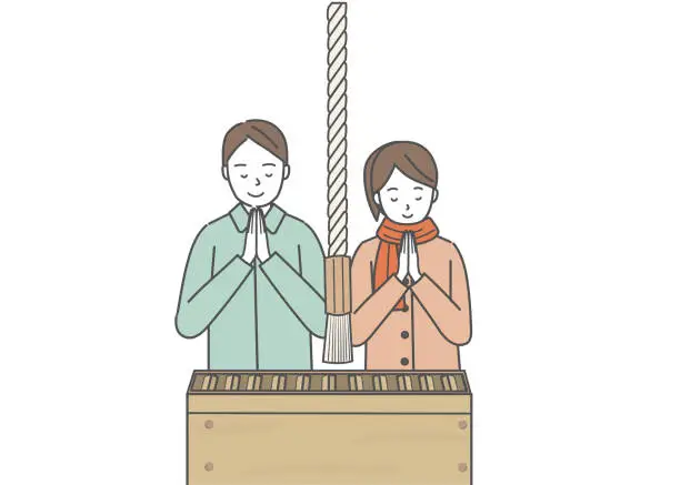 Vector illustration of Couple praying at shrine