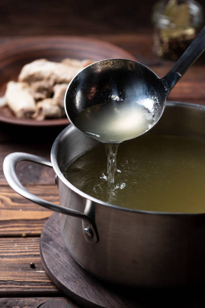istock Boiled fatty broth in a saucepan 1838996480