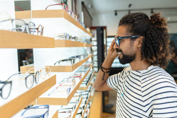 istock A customer buys glasses from an optician 1839024211