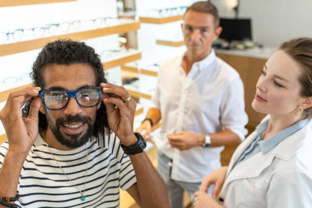 istock A customer buys glasses from an optician 1839024213