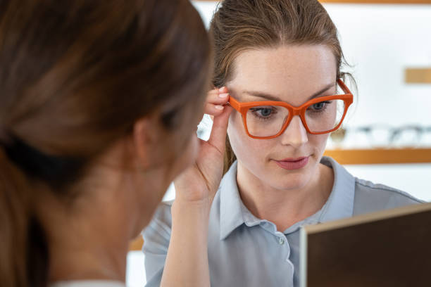 istock A customer buys glasses from an optician 1839024761
