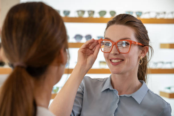 istock A customer buys glasses from an optician 1839024762