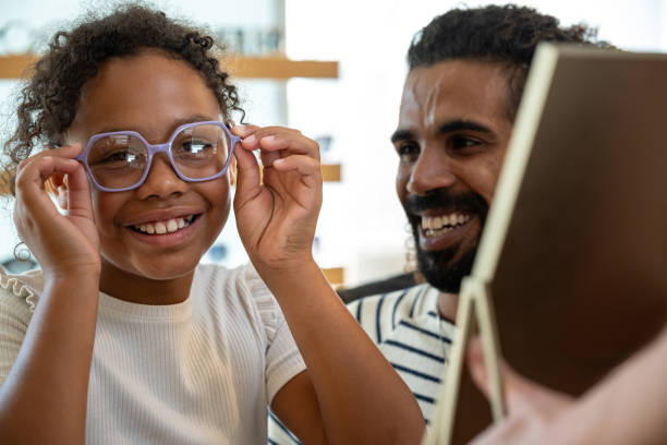 istock Buying glasses for a child at an optician 1839025309