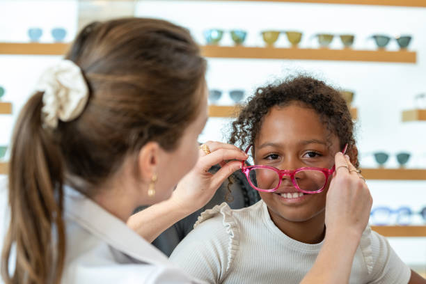 istock Buying glasses for a child at an optician 1839025311