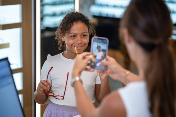 istock Buying glasses for a child at an optician 1839025347