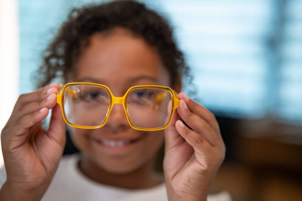istock Buying glasses for a child at an optician 1839025652