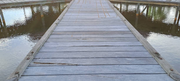 istock Rustic wooden bridge over a pond 1839029753