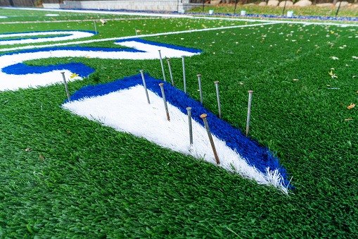 Turf Graphics Synthetic Turf Field Under Construction With Lines And Graphics Being ...