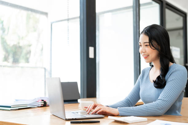 istock Young business woman freelancer using laptop at home office. 1839041159
