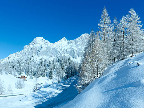 istock Morning winter alpine road. 183904808