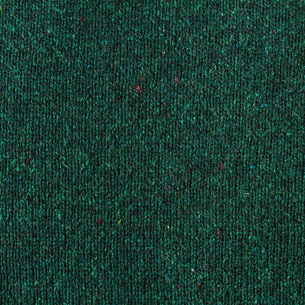 istock knitted jersey green background.  High resolution Fabric textile 183905309