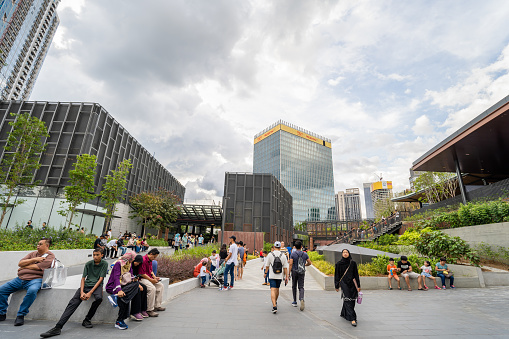 A modern shopping mall in the center of Almaty City. The Dostyk Plaza was opened in 2014. The image shows the dostyk plaza during summer season.