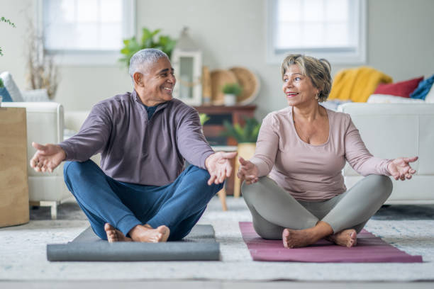 istock Seniors Yoga at Home 1839077300