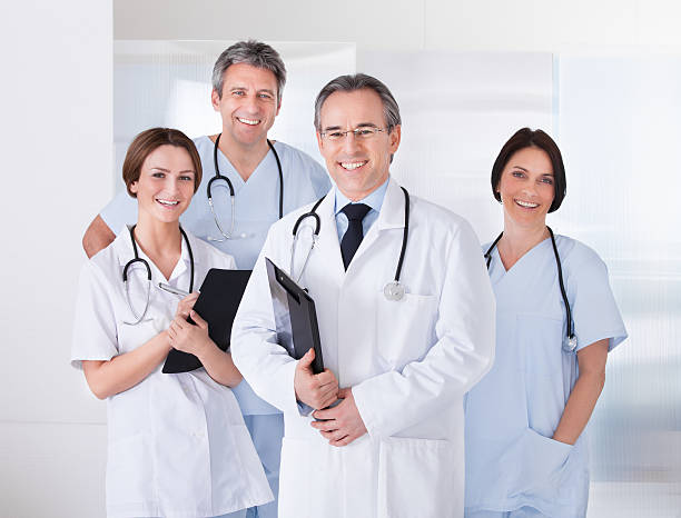 istock Male Doctor In Front Of Team 183911882