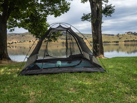 Mesh tent set up next to Lake Hume in the Victorian High Country