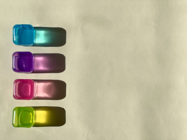 istock Transparent multicoloured plastic ice cubes. Coloured bright shadows 1839253757