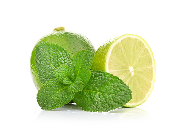 istock Limes and mint isolated on white background 183927147