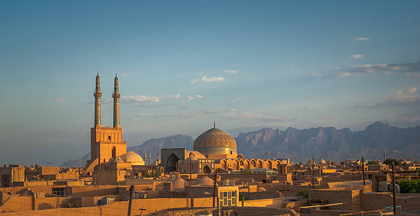 закат над древний город  йезд, иран - iran стоковые фото и изображения