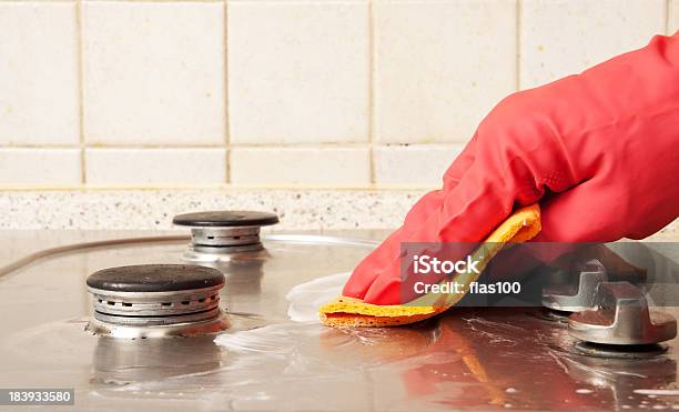 The Man Cleaning Gas Stove Stock Photo - Download Image Now - Cleaning, Stainless Steel, Burner - Stove Top
