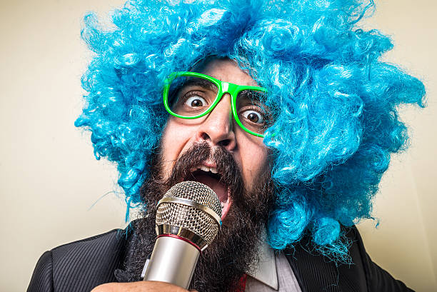 istock crazy funny bearded man with blue wig 183935317