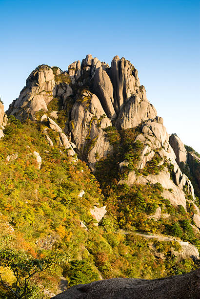 lotus peak of huangshan lotus peak of huangshan huangshan mountains stock pictures, royalty-free photos & images