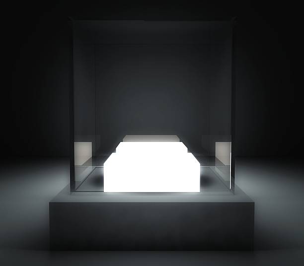 istock A 3D empty glass showcase in a black room 183936888