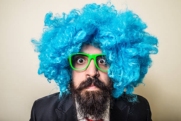 istock crazy funny bearded man with blue wig 183937315