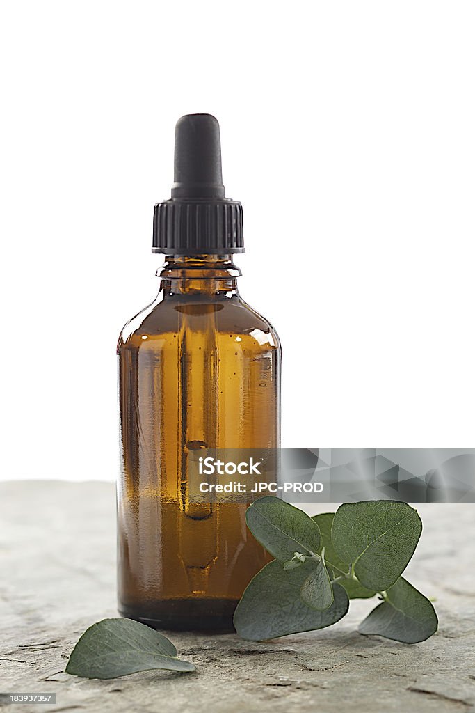 Eucalyptus essential oil bottle of eucalyptus oils with leaves Alternative Therapy Stock Photo