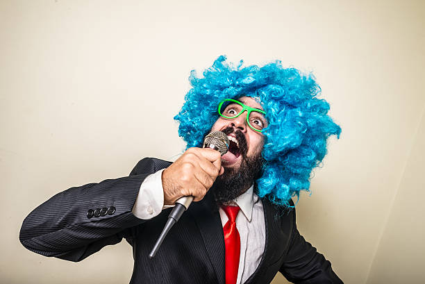 istock crazy funny bearded man with blue wig 183938365