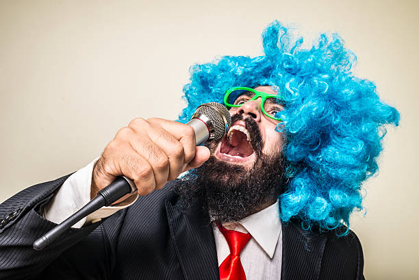 istock crazy funny bearded man with blue wig 183938402