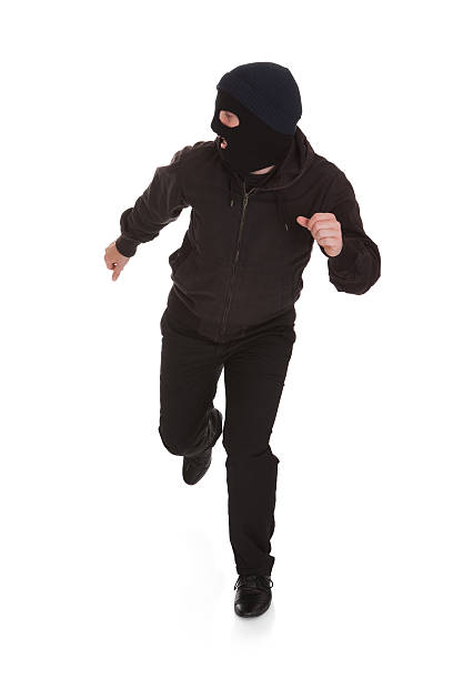Man Wearing Mask Running Over White Background