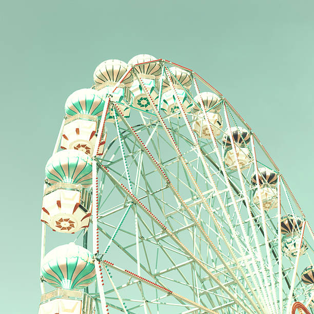 istock Ground view of a mint colored Ferris wheel 183938887