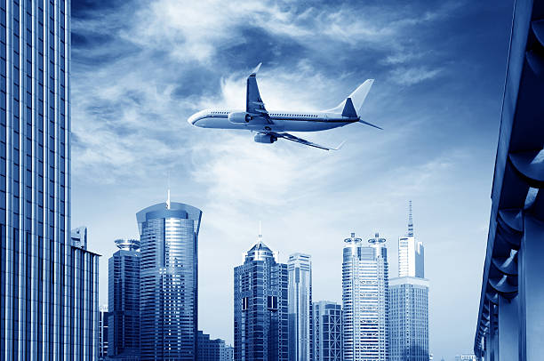 istock Airplane over the city 183938899