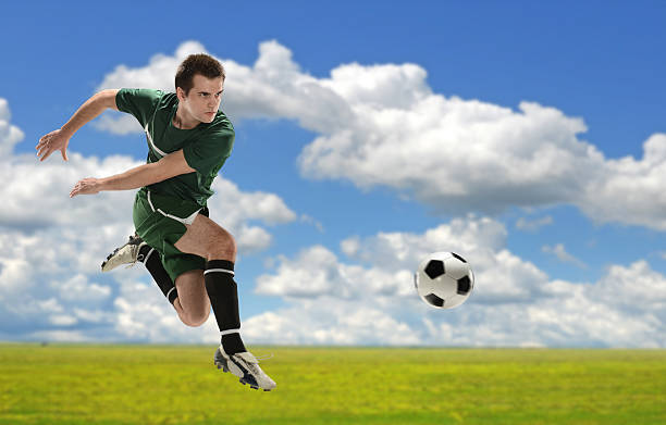 istock Soccer Player Kicking Ball 183940642