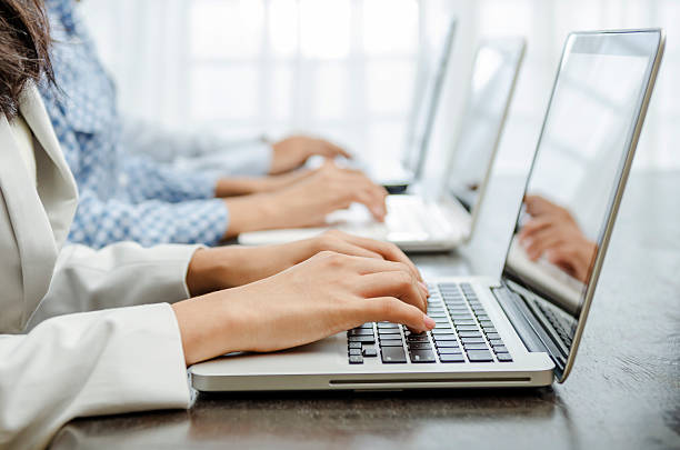 istock Closeup of business people working 183940992