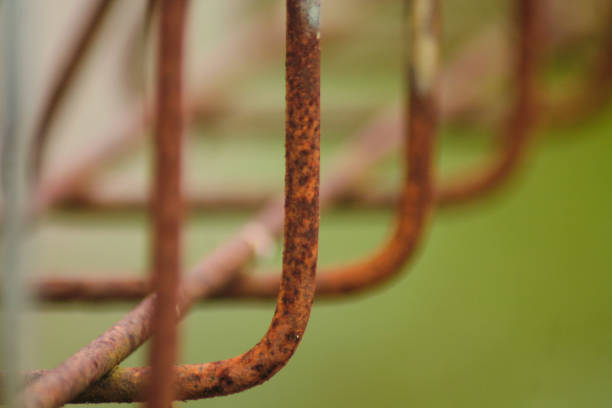 istock Close up of old and rusty iron fence 1839411421