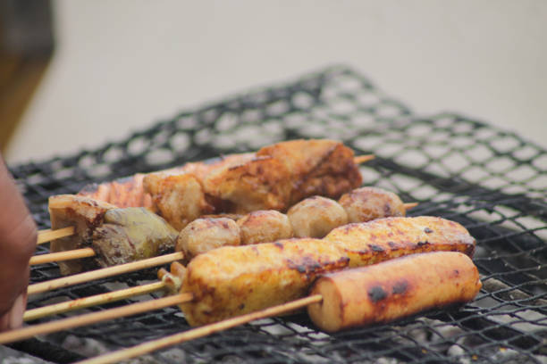 istock grilling bbq skewers at a food stall 1839411948