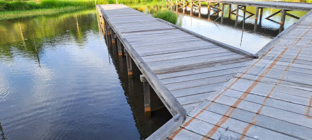 istock Rustic wooden bridge over a pond 1839412524