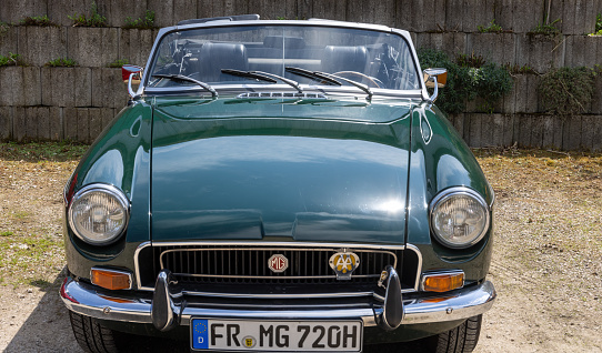 Bad Bellingen, Germany August 8, 2023: MG MGB famous British sports car in green in summer in Germany