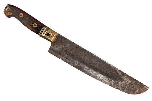Kitchen knife on concrete background. Weapon or kitchen utensil.