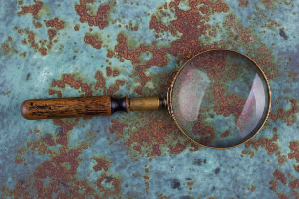 istock Vintage magnifying glass on metal rusty background, 1839450142