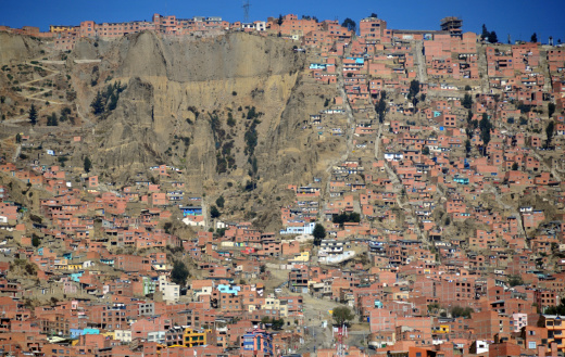 El Alto, La Paz department, Bolivia: cascade of brick and mud cubic houses -  canyon of the river Choqueyapu - photo by M.Torres