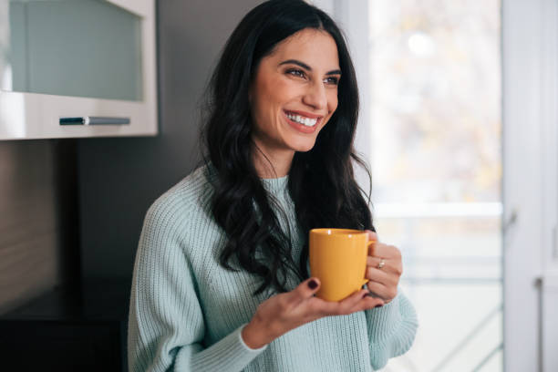istock Beautiful woman in the kitchen 1839487949