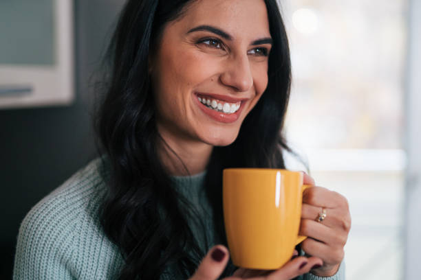 istock Beautiful woman in the kitchen 1839490046