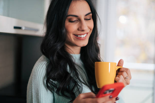 istock Beautiful woman in the kitchen 1839494627
