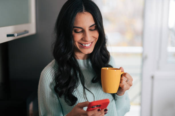 istock Beautiful woman in the kitchen 1839499366